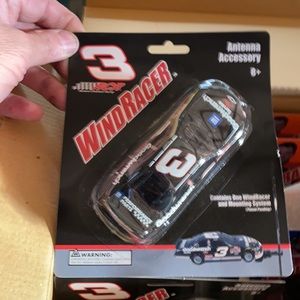 This is new old stock of NASCAR antenna accessory